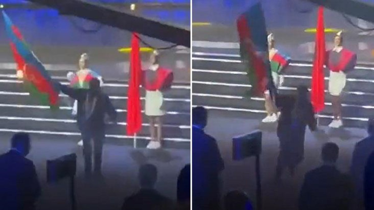 Ermenistan'da düzenlenen şampiyonada skandal! Vazifelinin elindeki Azerbaycan bayrağını alarak ateşe verdi